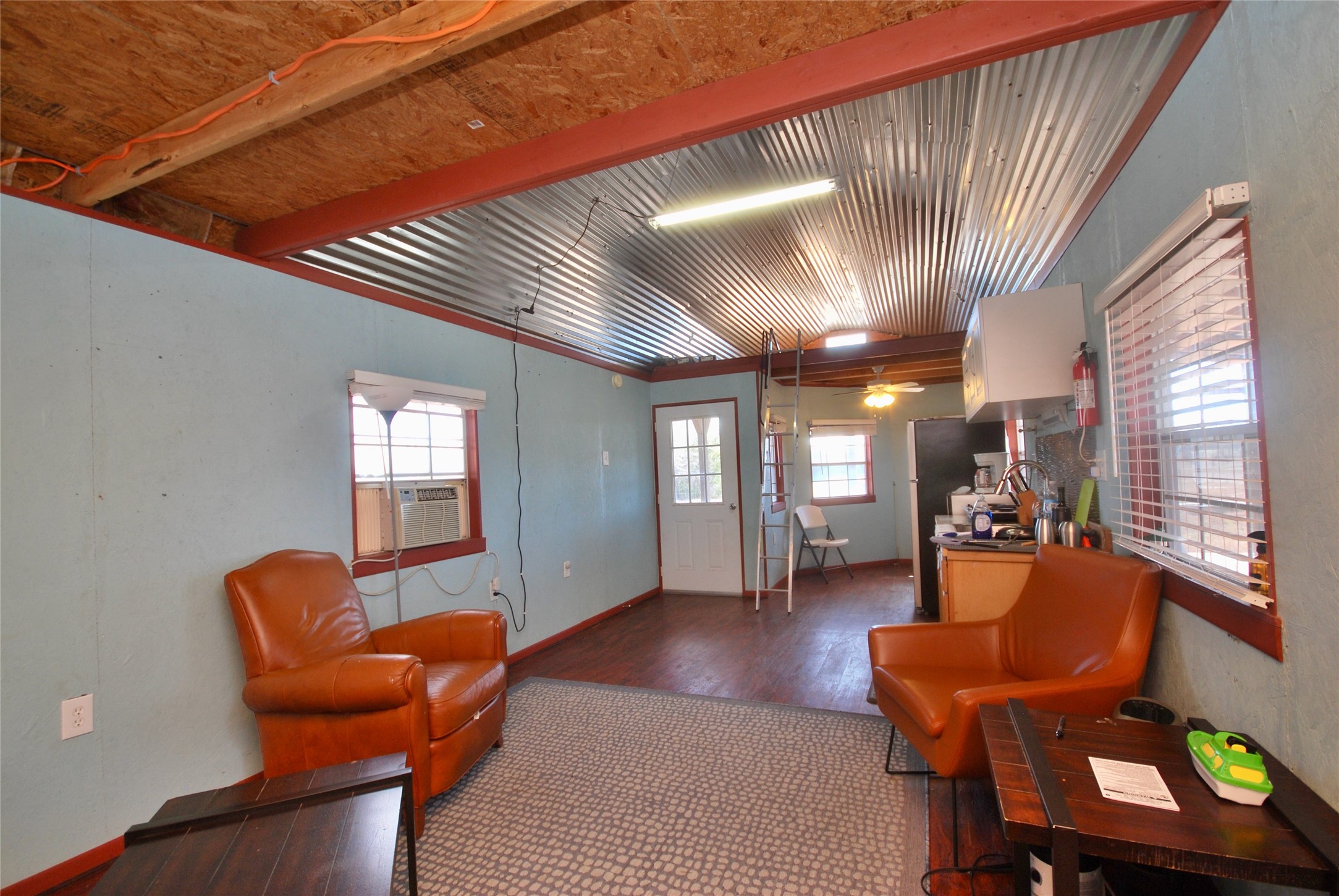 4850 Burke Road Flatonia, TX 78941 - Photo 18 of 45 a lobby with furniture and staircase