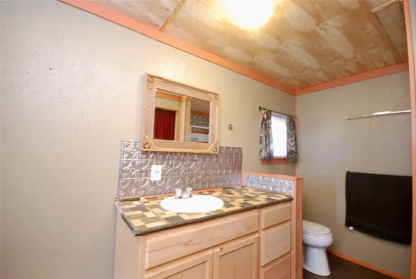 a view of a bathroom with a sink and a toilet