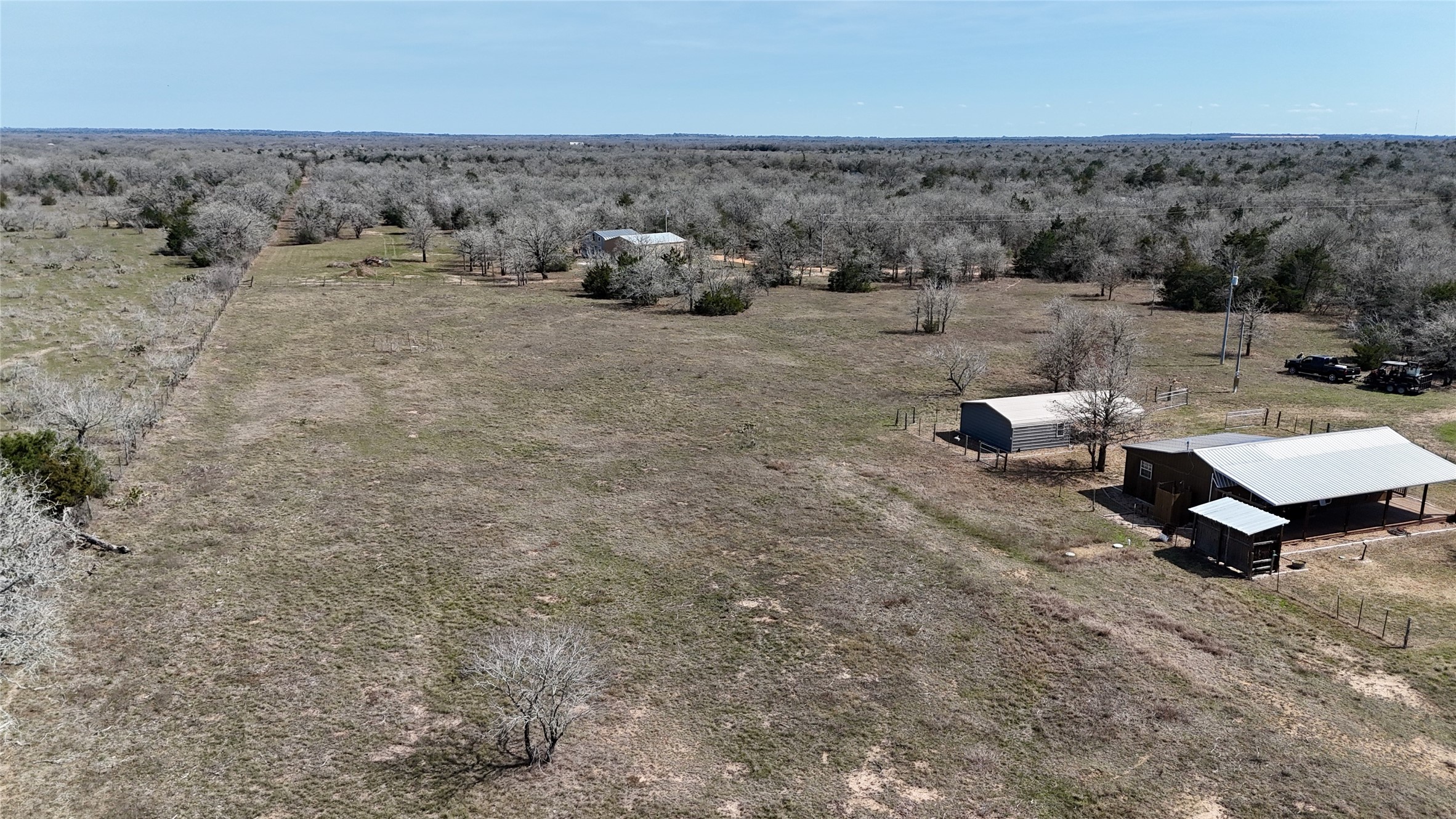 4850 Burke Road Flatonia, TX 78941 - Photo 35 of 45 an aerial view of a house with a yard and covered with snow
