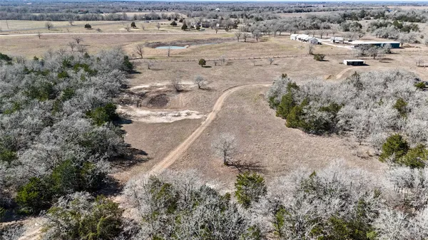 an aerial view of beach and residential space