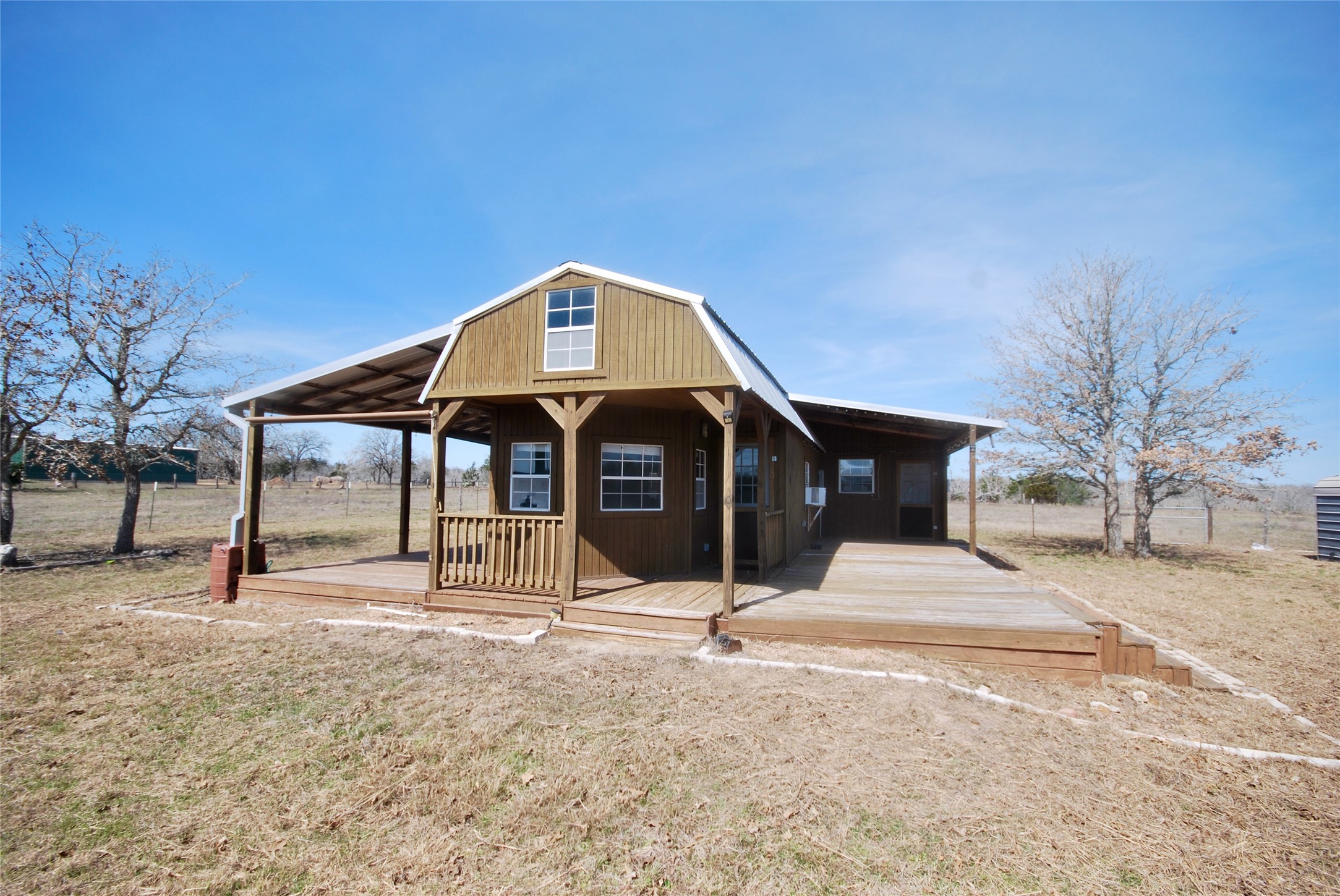 4850 Burke Road Flatonia, TX 78941 - Photo 9 of 45 a front view of a house with a yard