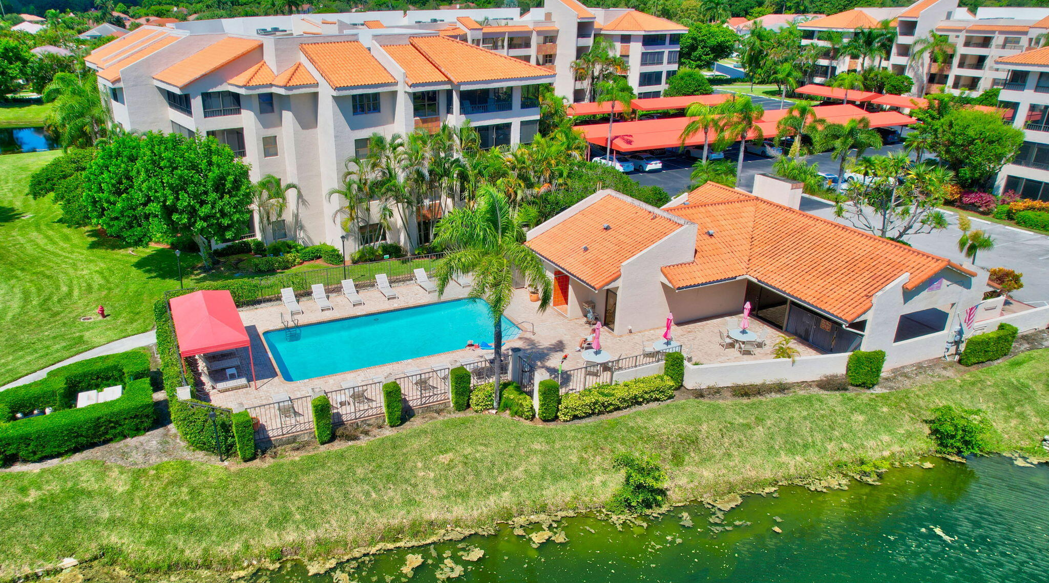 7484 La Paz Boulevard, Unit 103 Boca Raton, FL 33433 - Photo 38 of 50 an aerial view of a house with swimming pool patio and outdoor seating