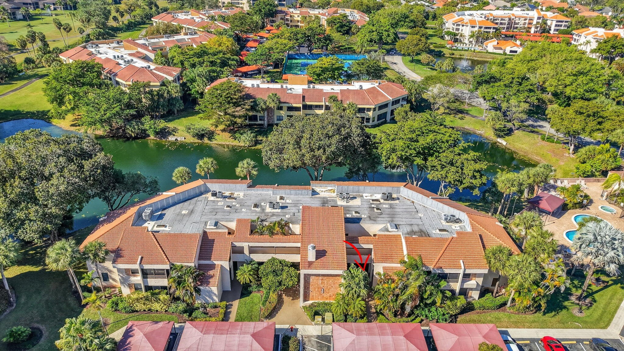 7484 La Paz Boulevard, Unit 103 Boca Raton, FL 33433 - Photo 41 of 50 an aerial view of a house