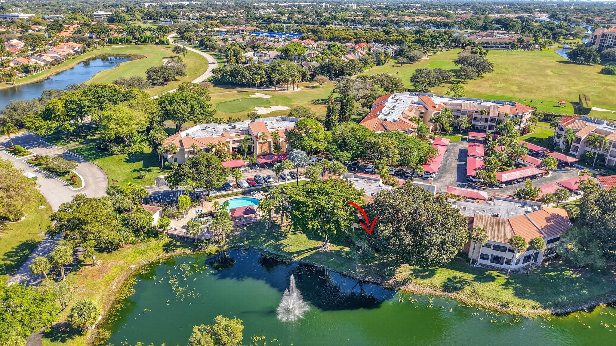 7484 La Paz Boulevard, Unit 103 Boca Raton, FL 33433 - Photo 47 of 50 a city view with lake view