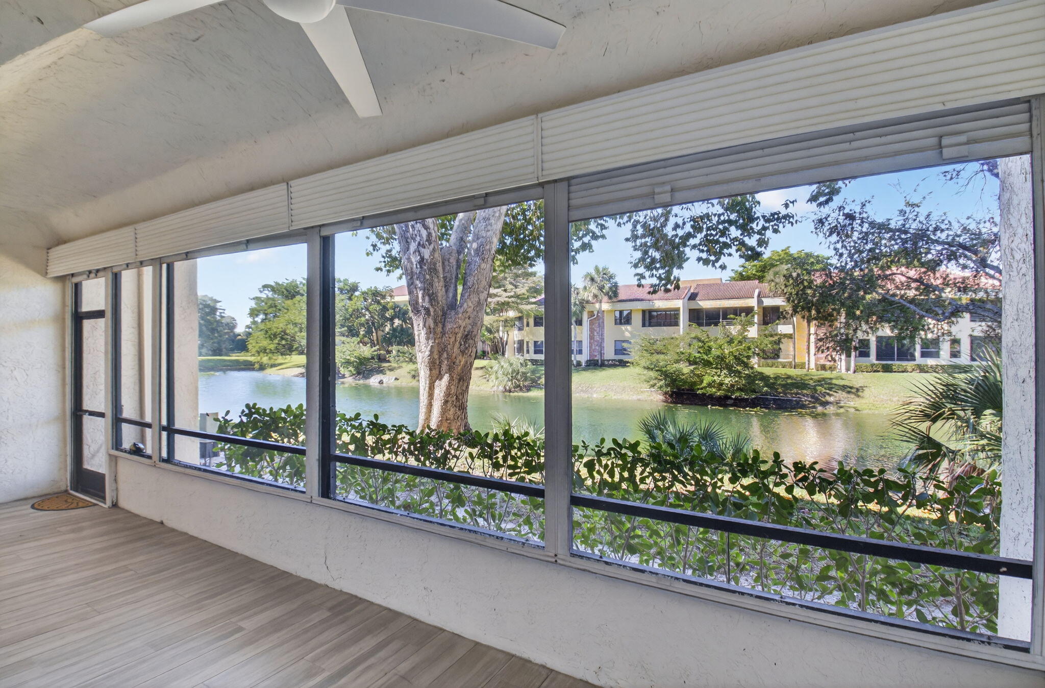 7484 La Paz Boulevard, Unit 103 Boca Raton, FL 33433 - Photo 6 of 50 a window with lake view