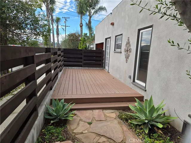 a view of a backyard with sitting area