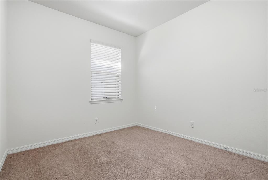 1724 Passage Key Lane Ruskin, FL 33570 - Photo 24 of 46 an empty room with a window