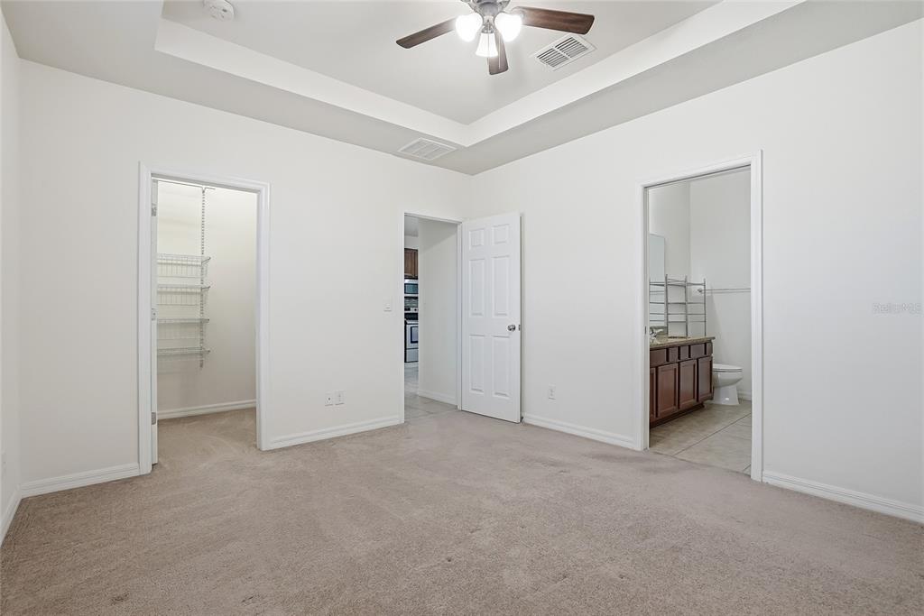 1724 Passage Key Lane Ruskin, FL 33570 - Photo 26 of 46 an empty room with closet and windows