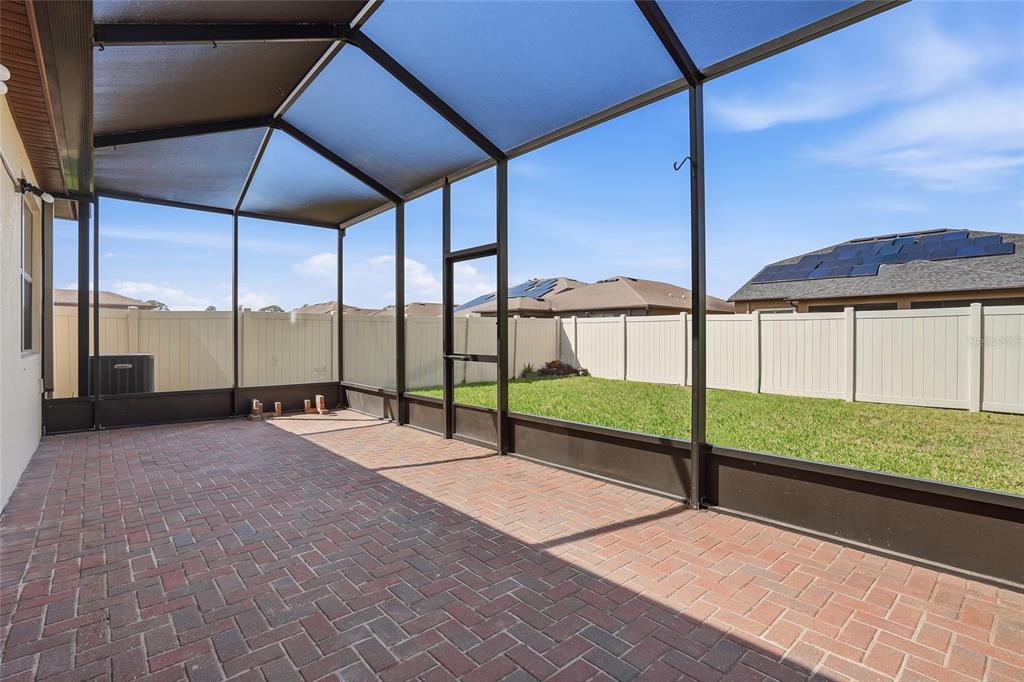 1724 Passage Key Lane Ruskin, FL 33570 - Photo 35 of 46 a view of an empty room with a floor to ceiling window