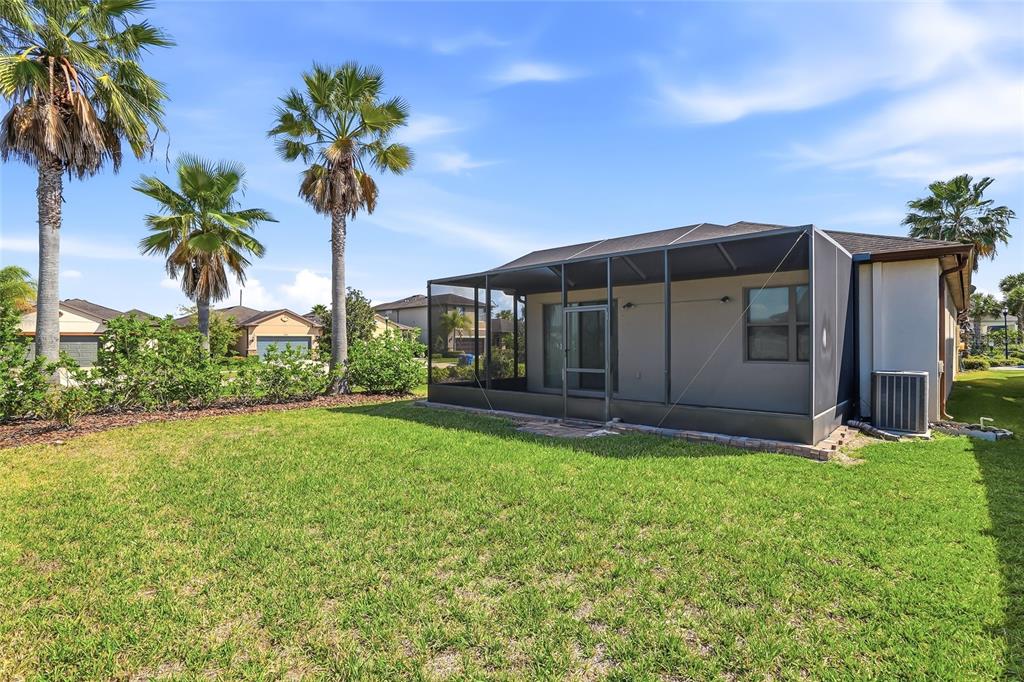 1724 Passage Key Lane Ruskin, FL 33570 - Photo 37 of 46 a house view with a garden space