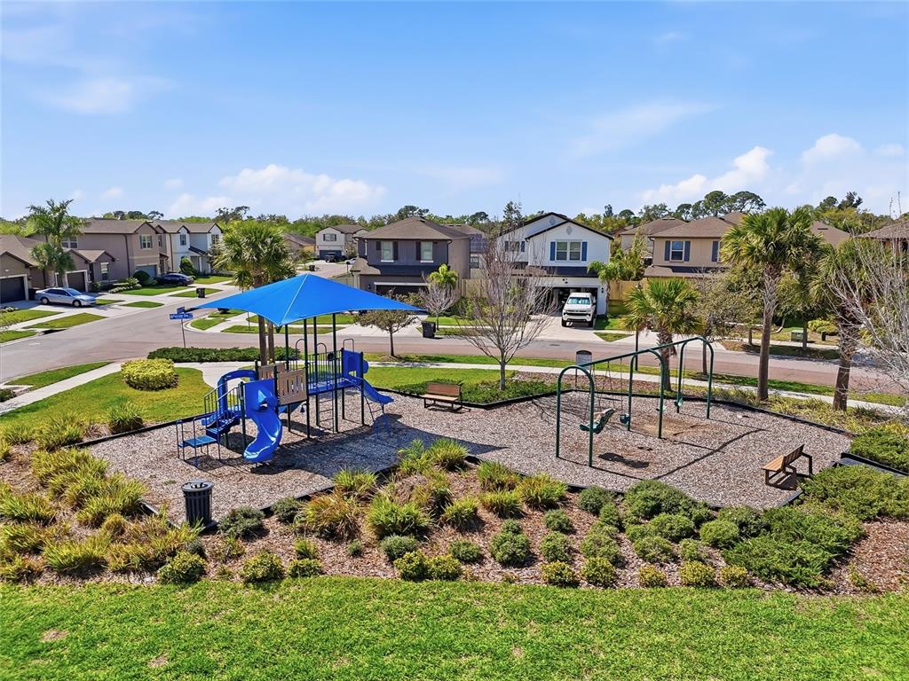 1724 Passage Key Lane Ruskin, FL 33570 - Photo 45 of 46 an aerial view of a house with outdoor space patio swimming pool and outdoor seating