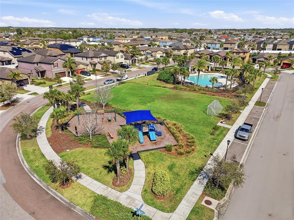 1724 Passage Key Lane Ruskin, FL 33570 - Photo 46 of 46 an aerial view of a house with a garden