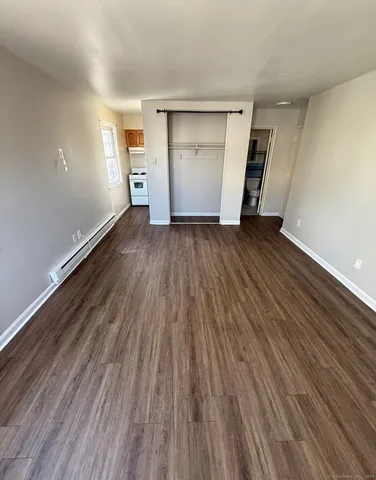 a bathroom with a toilet and a sink