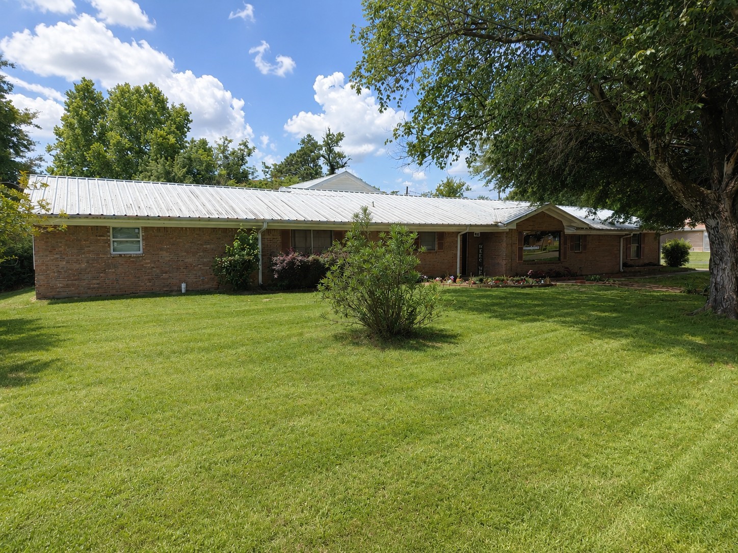416 Division Street Jewett, TX 75846 - Photo 35 of 38 a view of a house with a yard