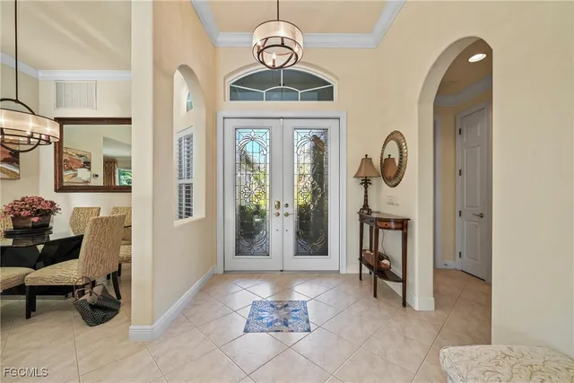 a view of a hallway with entryway dining room and livingroom view