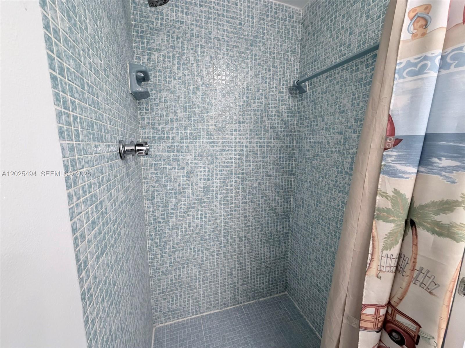 9159 Southwest 77th Avenue, Unit 112 Miami, FL 33156 - Photo 21 of 38 a bathroom with a shower