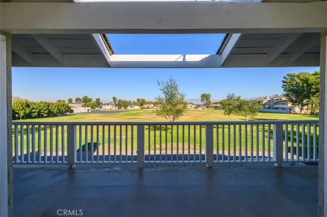 a view of balcony with furniture