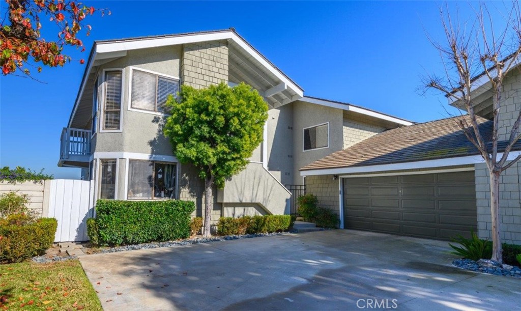 42 Lakeview Irvine, CA 92604 - Photo 44 of 46 a front view of a house with garden