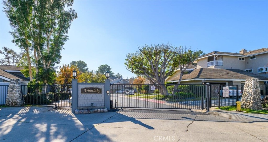 42 Lakeview Irvine, CA 92604 - Photo 46 of 46 a front view of a house with a tree