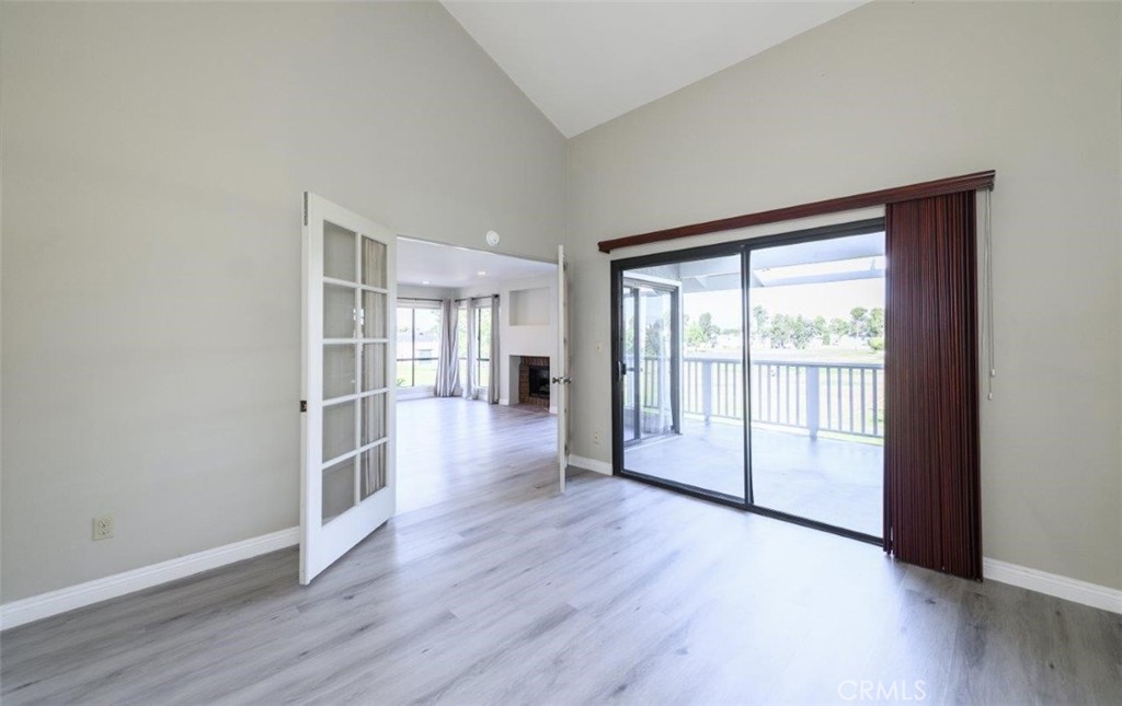 42 Lakeview Irvine, CA 92604 - Photo 8 of 46 a view of empty room with wooden floor and fan