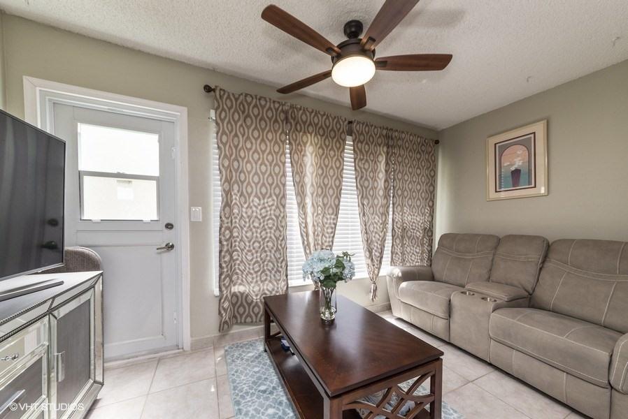 18940 Stewart Circle, Unit 8 Boca Raton, FL 33496 - Photo 14 of 22 12_18940StewartCr_8_3_FamilyRoom_LowRes[