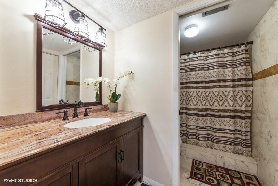 18940 Stewart Circle, Unit 8 Boca Raton, FL 33496 - Photo 16 of 22 14_18940StewartCr_8_13_MasterBathroom_Lo