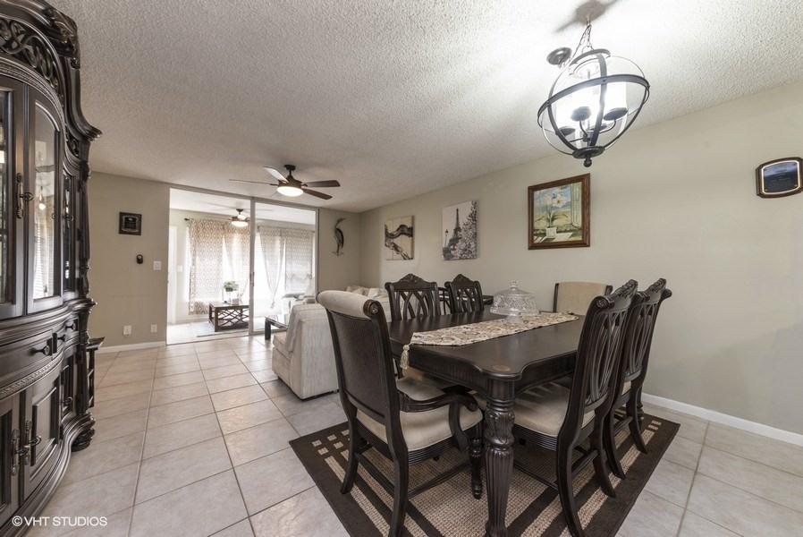 18940 Stewart Circle, Unit 8 Boca Raton, FL 33496 - Photo 8 of 22 06_18940StewartCr_8_93001_LivingRoomDini