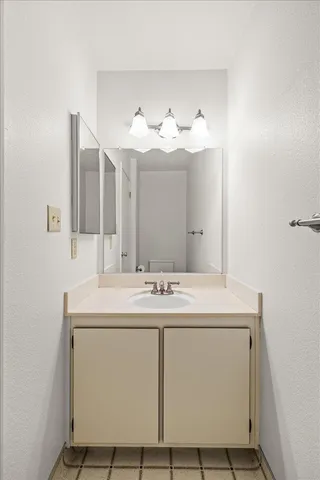 a utility room with closet dryer and washer