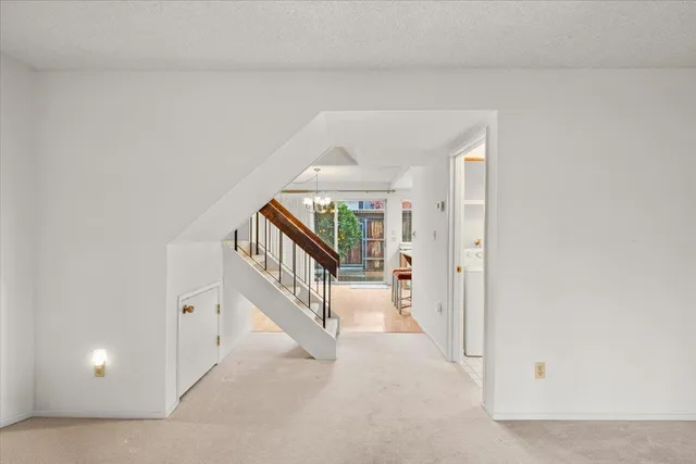 a view of an entryway with stairs