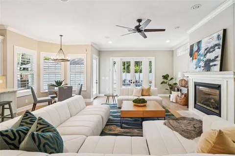 a kitchen with stainless steel appliances granite countertop a refrigerator stove and sink