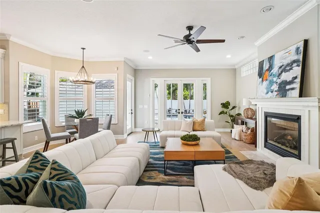 a kitchen with stainless steel appliances granite countertop a refrigerator stove and sink