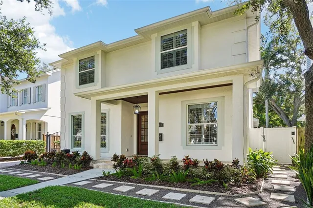 a view of a livingroom with furniture window and wooden floor
