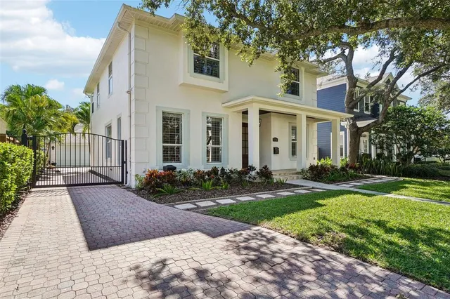 a living room with fireplace furniture and a wooden floor