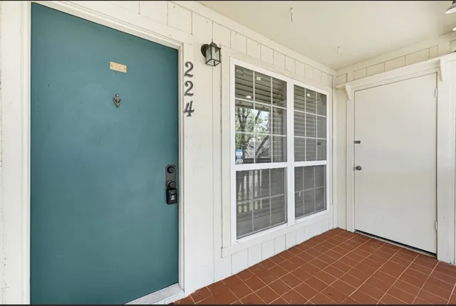 a view of empty room with windows