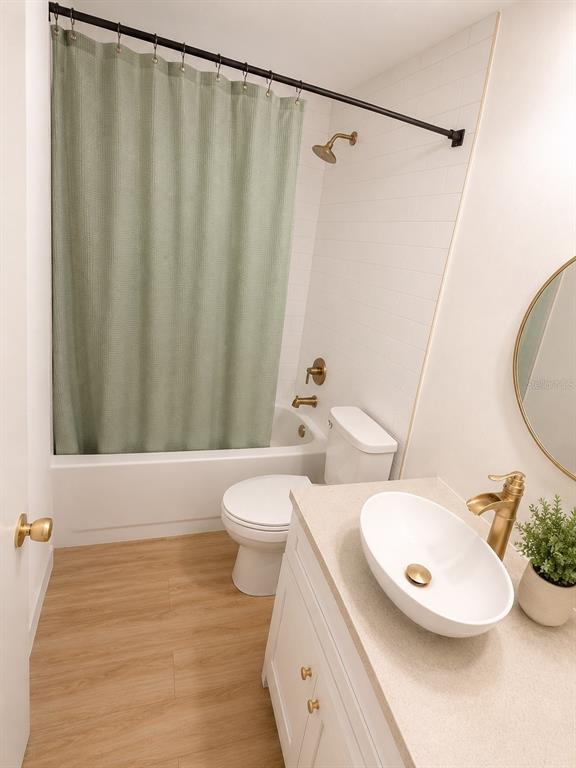 338 Mantis Loop Apopka, FL 32703 - Photo 11 of 11 a bathroom with a sink and a mirror