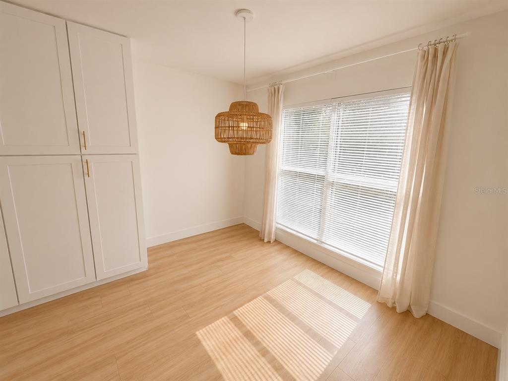 338 Mantis Loop Apopka, FL 32703 - Photo 10 of 11 an empty room with windows