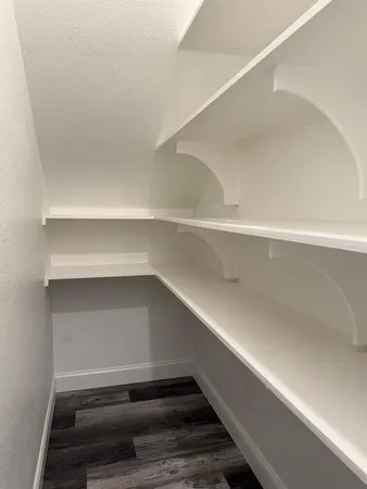 a storage room with washer and dryer