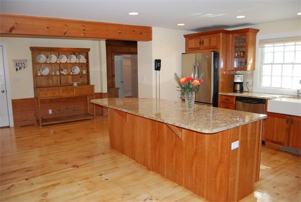 4 Churchill Lane Lexington, MA 02421 - Photo 8 of 30 a kitchen with stainless steel appliances granite countertop a sink and cabinets