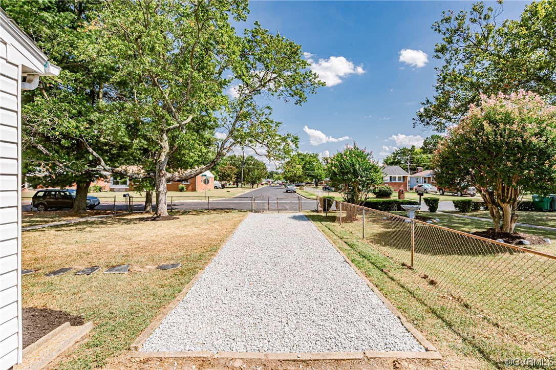 2310 Apollo Road Richmond, VA 23223 - Photo 4 of 22 a view of a swimming pool with a patio