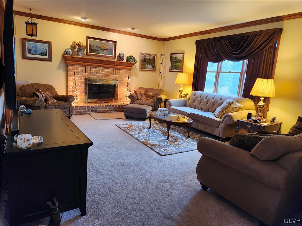 6273 Hower Road Pen Argyl, PA 18072 - Photo 11 of 37 a living room with furniture and a fireplace