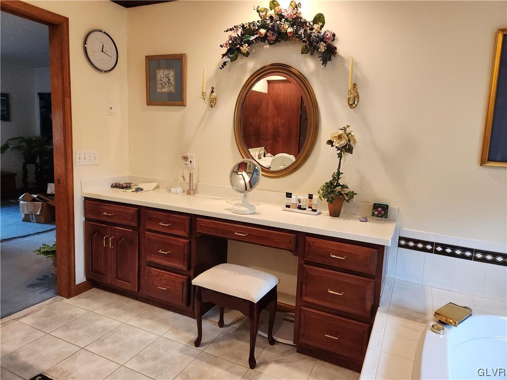 6273 Hower Road Pen Argyl, PA 18072 - Photo 21 of 37 a bathroom with a sink and a mirror