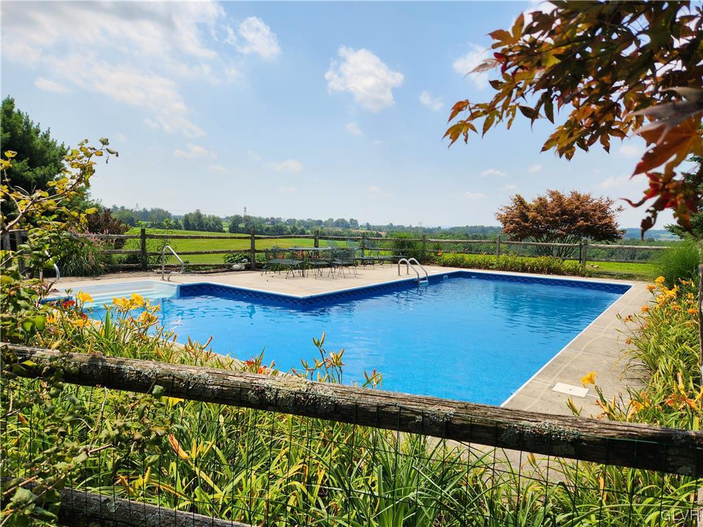 6273 Hower Road Pen Argyl, PA 18072 - Photo 26 of 37 a view of a swimming pool with a yard