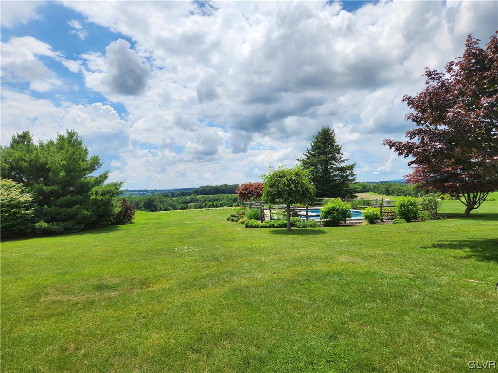 6273 Hower Road Pen Argyl, PA 18072 - Photo 28 of 37 a view of a big yard with large trees