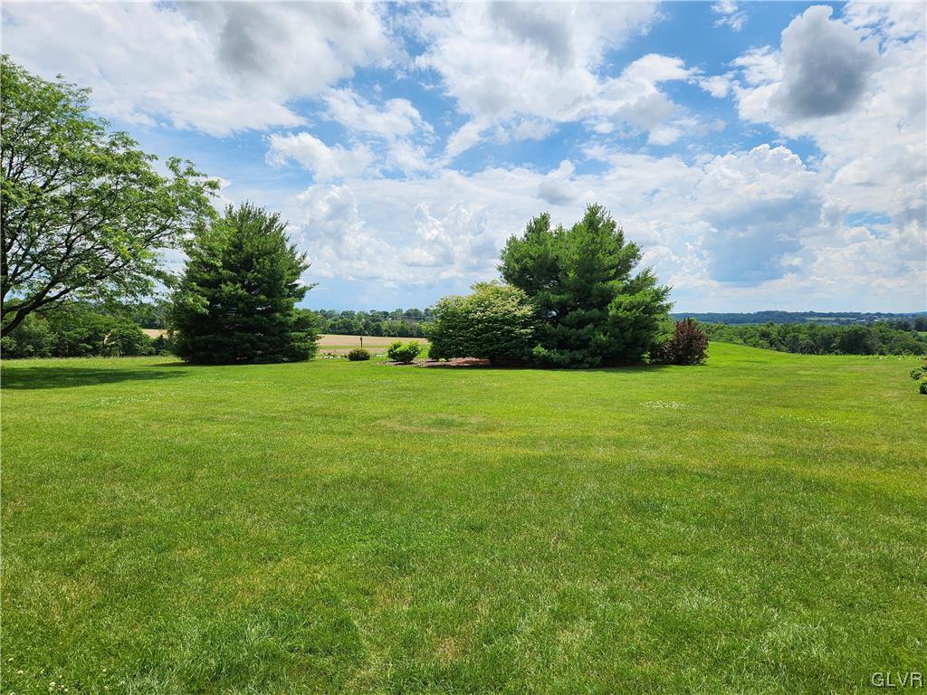 6273 Hower Road Pen Argyl, PA 18072 - Photo 29 of 37 a backyard of a house with lots of green space
