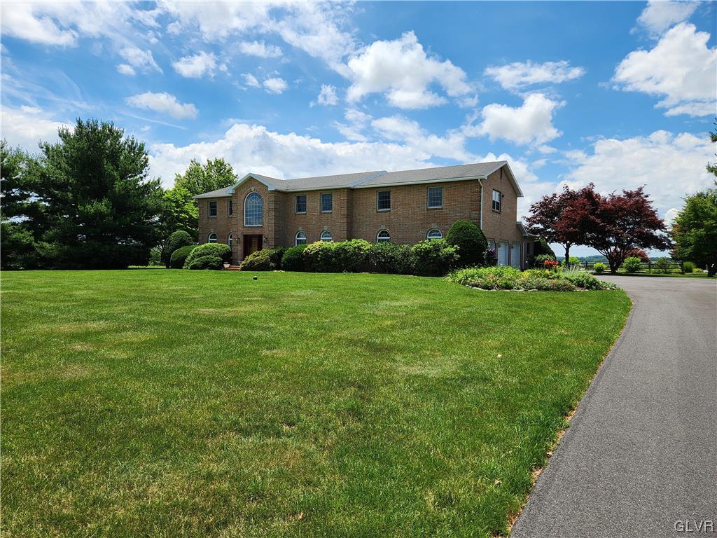 6273 Hower Road Pen Argyl, PA 18072 - Photo 30 of 37 a view of a yard in front of a house