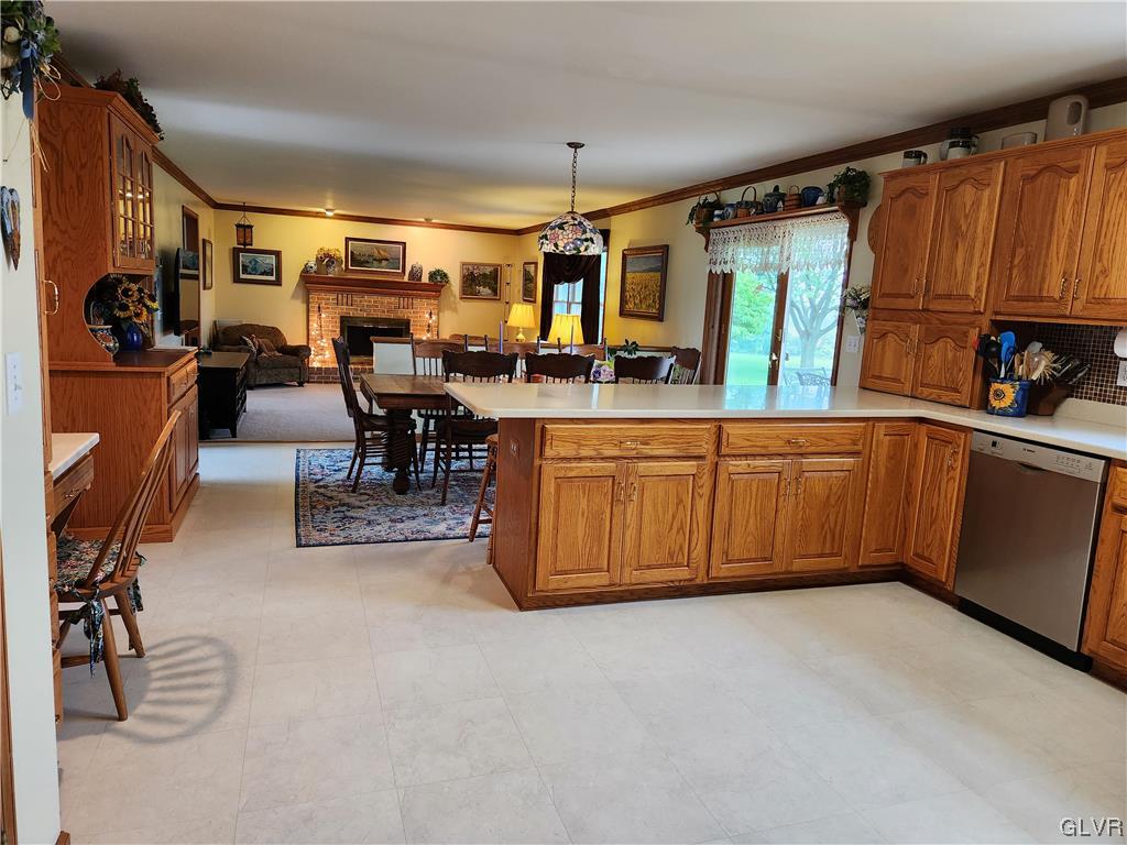 6273 Hower Road Pen Argyl, PA 18072 - Photo 6 of 37 a kitchen with lots of counter top space and dining table