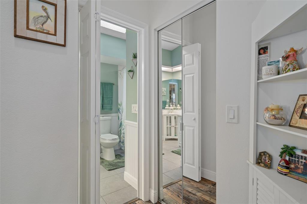 4749 Westbury Court, Unit 19 New Port Richey, FL 34655 - Photo 27 of 46 a view of bathroom with shower and hardwood floor