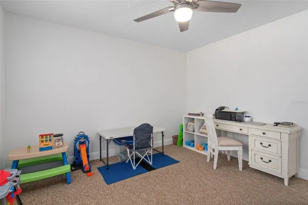 a view of a workspace with furniture