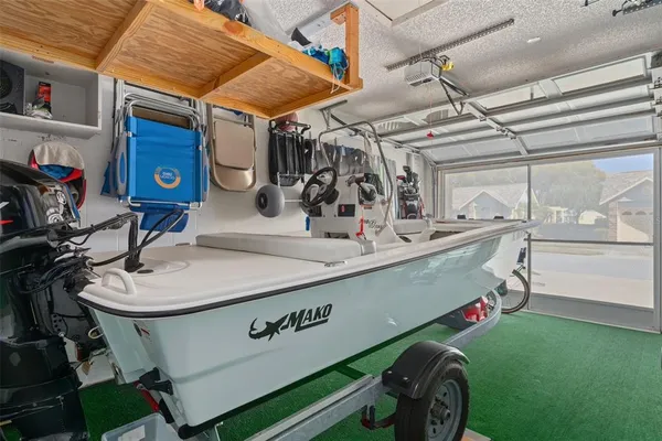a bathroom with a sink a mirror and next to a window