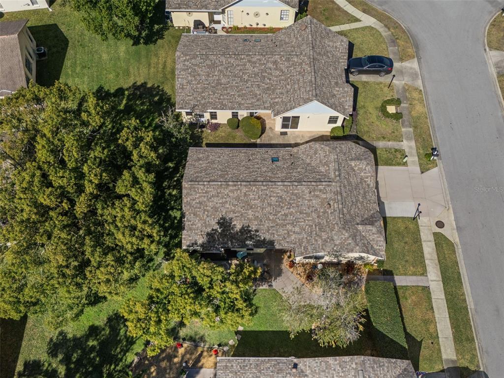 4749 Westbury Court, Unit 19 New Port Richey, FL 34655 - Photo 43 of 46 an aerial view of a house with a yard